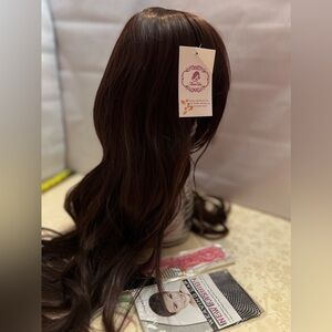 Full coverage rich brown wig with bangs and lustrous shine.